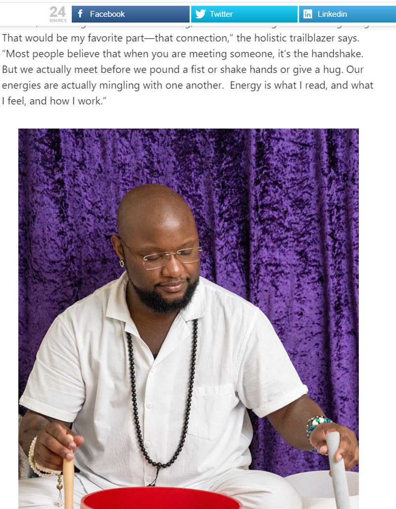 Liam J. Adair playing crystal singing bowls, photographed for the OutSmart Magazine feature Holistic Healer, December 2022